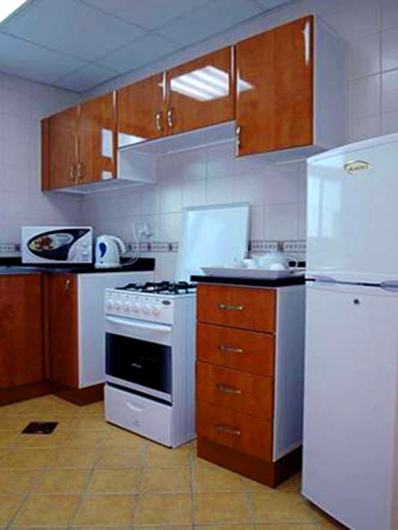 Arcadia Hotel Suites Sharjah Værelse billede